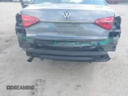 ✅ 2016 Volkswagen Passat S • VIN: 1VWAT7A38GC057985 • Lot: 43351909. Wystawiony na IAAI z przebiegiem 163 828 mil. Bezpłatny archiwum sprzedaży aukcyjnych z USA i szczegółowy raport historii pojazdu na DreamBid. Zdjęcie 6.