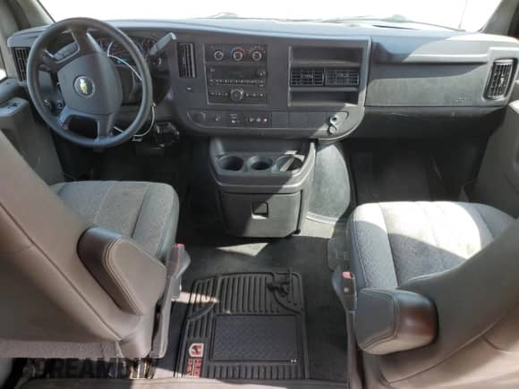 2012 Chevrolet Express Passenger 1LT с VIN 1GAZG1FG4C1190180, выставлен на аукционе Copart как лот 60436354 с пробегом 58 412 миль миль и Списание • Salvage title. История ставок и продаж доступна на DreamBid. Изображение 8.