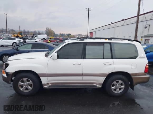 ✅ 2000 Toyota Land Cruiser • VIN: JT3HT05J6Y0120283 • Lot: 43677278. Wystawiony na IAAI z przebiegiem 288 299 mil. Bezpłatny archiwum sprzedaży aukcyjnych z USA i szczegółowy raport historii pojazdu na DreamBid. Zdjęcie 14.
