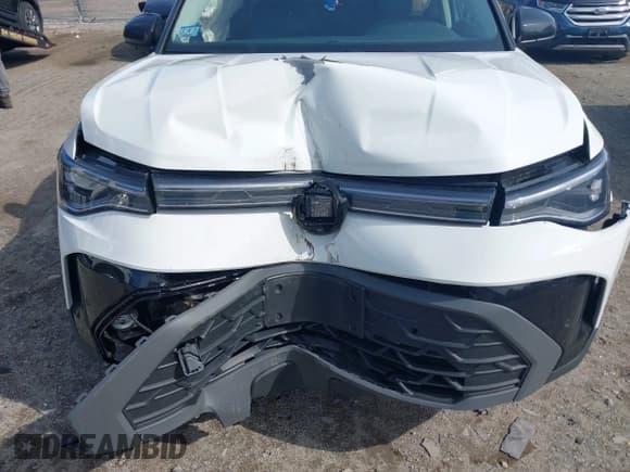 ✅ 2025 Volkswagen Taos SE Black • VIN: 3VV2C7B21SM034716 • Lot: 43169058. Wystawiony na IAAI z przebiegiem 4 773 mil. Bezpłatny archiwum sprzedaży aukcyjnych z USA i szczegółowy raport historii pojazdu na DreamBid. Zdjęcie 6.