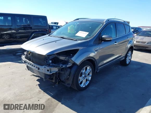 ✅ 2014 Ford Escape Titanium • VIN: 1FMCU0J92EUE55006 • Lot: 43559574. Wystawiony na IAAI z przebiegiem 98 269 mil. Bezpłatny archiwum sprzedaży aukcyjnych z USA i szczegółowy raport historii pojazdu na DreamBid. Zdjęcie 18.