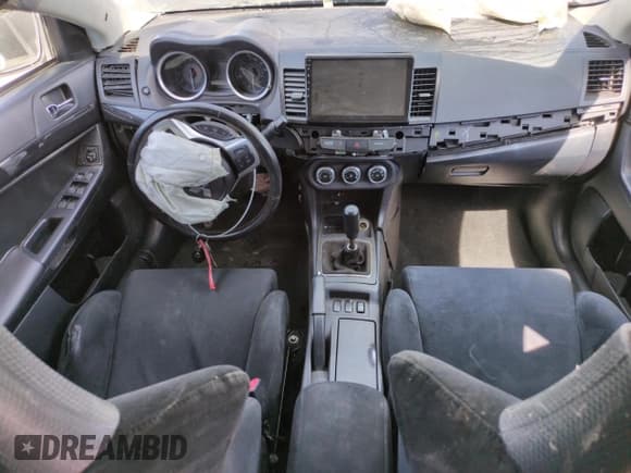 ✅ 2013 Mitsubishi Lancer Evolution GSR • VIN: JA32W8FV9DU008863 • Lot: 66937715. Wystawiony na Copart z przebiegiem 68 327 mil. Bezpłatny archiwum sprzedaży aukcyjnych z USA i szczegółowy raport historii pojazdu na DreamBid. Zdjęcie 8.