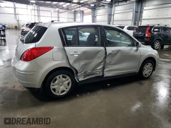 ✅ 2010 Nissan Versa SL • VIN: 3N1BC1CP2AL439528 • Lot: 90512465. Listed on Copart with 94,710 mi. Free auction sales archive from the USA and detailed vehicle history report at DreamBid. Image 3.