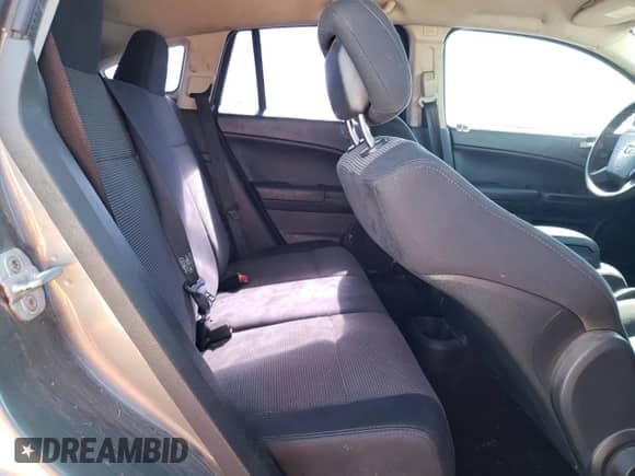 2012 Dodge Caliber SXT Plus z VIN 1C3CDWEA8CD532507, wystawiony jako Copart lot #55634765 z przebiegiem 163 877 mil mil oraz Czysty tytuł • Clean title. Historia ofert i sprzedaży dostępna na DreamBid. Obrazek 10.