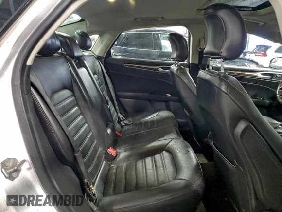 ✅ 2015 Ford Fusion SE Hybrid • VIN: 3FA6P0LU6FR214171 • Lot: 94726935. Wystawiony na Copart z przebiegiem 126 593 mil. Bezpłatny archiwum sprzedaży aukcyjnych z USA i szczegółowy raport historii pojazdu na DreamBid. Zdjęcie 10.