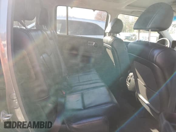 ✅ 2012 Honda Pilot Touring • VIN: 5FNYF4H99CB022886 • Лот: 93527735. Опубликован ранее на Copart с пробегом 169 955 миль. Бесплатный доступ к архиву аукционных продаж из США и подробный отчёт об истории автомобиля на DreamBid. Изображение 11.