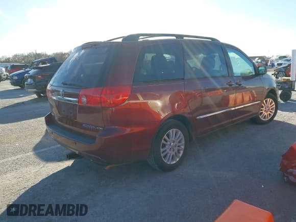 ✅ 2010 Toyota Sienna XLE • VIN: 5TDYK4CCXAS325649 • Lot: 43745133. Listed on IAAI with 130,180 mi. Free auction sales archive from the USA and detailed vehicle history report at DreamBid. Image 4.