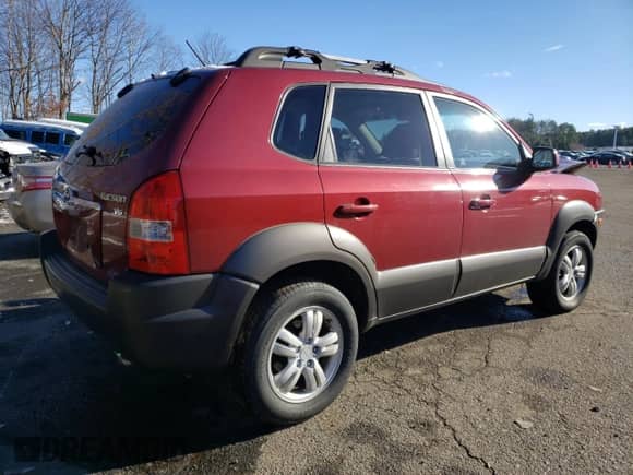 2006 Hyundai Tucson GLS z VIN KM8JN12D66U431452, wystawiony jako Copart lot #83564274 z przebiegiem 229 855 mil mil oraz Szkoda całkowita • Salvage title. Historia ofert i sprzedaży dostępna na DreamBid. Obrazek 3.