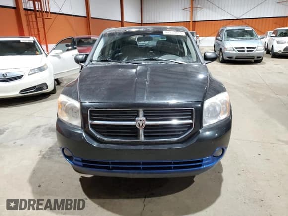 ✅ 2008 Dodge Caliber SXT • VIN: 1B3HB48B58D658865 • Лот: 84233514. Опубликован ранее на Copart с пробегом 211 769 миль. Бесплатный доступ к архиву аукционных продаж из США и подробный отчёт об истории автомобиля на DreamBid. Изображение 5.