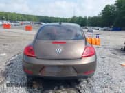 ✅ 2014 Volkswagen Beetle 1.8T • VIN: 3VWJ07AT2EM664064 • Lot: 43036687. Listed on IAAI with 112,000 mi. Free auction sales archive from the USA and detailed vehicle history report at DreamBid. Image 17.