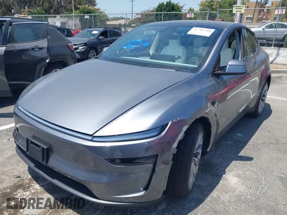 ✅ 2026 Tesla Model Y Long Range Launch Series • VIN: 7SAYGDEE6TF329725 • Lot: 42609518. Listed on IAAI with 1,640 mi. Free auction sales archive from the USA and detailed vehicle history report at DreamBid. Image 2.
