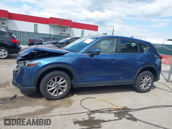 ✅ 2023 Mazda CX-5 S • VIN: JM3KFBAM2P0126351 • Lot: 42340700. Listed on IAAI with 11,995 mi. Free auction sales archive from the USA and detailed vehicle history report at DreamBid. Image 14.
