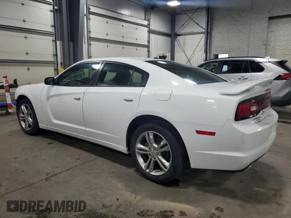✅ 2013 Dodge Charger SXT • VIN: 2C3CDXJG7DH564305 • Lot: 82084615. Listed on Copart with 83,713 mi. Free auction sales archive from the USA and detailed vehicle history report at DreamBid. Image 2.