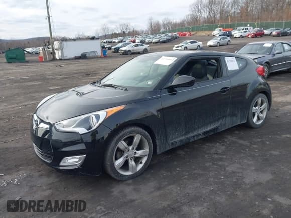 ✅ 2014 Hyundai Veloster • VIN: KMHTC6ADXEU213185 • Lot: 41704012. Wystawiony na IAAI z przebiegiem 144 905 mil. Bezpłatny archiwum sprzedaży aukcyjnych z USA i szczegółowy raport historii pojazdu na DreamBid. Zdjęcie 2.