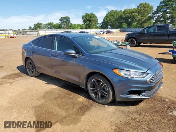 ✅ 2018 Ford Fusion SE • VIN: 3FA6P0HD0JR223126 • Лот: 57888185. Опубликован ранее на Copart с пробегом 95 459 миль. Бесплатный доступ к архиву аукционных продаж из США и подробный отчёт об истории автомобиля на DreamBid. Изображение 4.