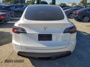 ✅ 2024 Tesla Model Y Long Range • VIN: 7SAYGDEE5RF066748 • Лот: 95666255. Опубликован ранее на Copart с пробегом 20 504 миль. Бесплатный доступ к архиву аукционных продаж из США и подробный отчёт об истории автомобиля на DreamBid. Изображение 6.