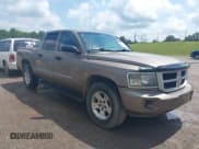✅ 2010 Dodge Dakota Bighorn/Lonestar • VIN: 1D7CW3GK3AS130838 • Lot: 42473115. Wystawiony na IAAI z przebiegiem 205 215 mil. Bezpłatny archiwum sprzedaży aukcyjnych z USA i szczegółowy raport historii pojazdu na DreamBid. Zdjęcie 1.