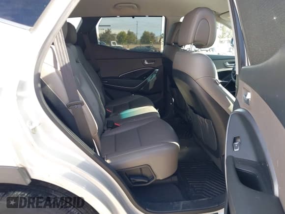 ✅ 2014 Hyundai Santa Fe • VIN: 5XYZU3LB7EG205102 • Lot: 43657537. Wystawiony na IAAI z przebiegiem 142 689 mil. Bezpłatny archiwum sprzedaży aukcyjnych z USA i szczegółowy raport historii pojazdu na DreamBid. Zdjęcie 8.