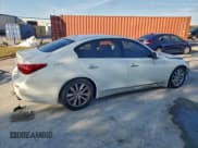 ✅ 2014 Infiniti Q50 Premium • VIN: JN1BV7AP0EM681066 • Lot: 94933945. Listed on Copart with 112,213 mi. Free auction sales archive from the USA and detailed vehicle history report at DreamBid. Image 3.