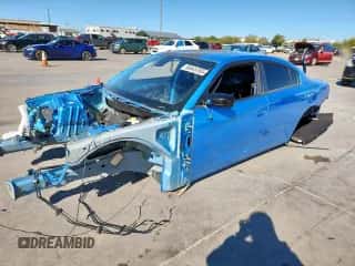 2023 Dodge Charger Scat Pack with VIN 2C3CDXGJ1PH631486, listed as a Copart auction lot 90645765 with Not provided miles and Salvage title. Bid and sale history available at DreamBid. Image 1.