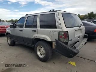 ✅ 1995 Jeep Grand Cherokee Laredo • VIN: 1J4GZ58S2SC703196 • Лот: 68571944. Опубликован ранее на Copart с пробегом 264 876 миль. Бесплатный доступ к архиву аукционных продаж из США и подробный отчёт об истории автомобиля на DreamBid. Изображение 2.