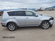 ✅ 2010 Mitsubishi Outlander GT • VIN: JA4JT5AX0AZ000107 • Lot: 42724251. Listed on IAAI with 221,918 mi. Free auction sales archive from the USA and detailed vehicle history report at DreamBid. Image 13.