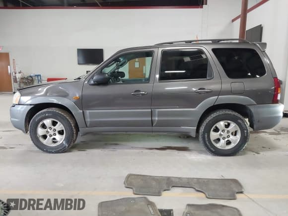 ✅ 2002 Mazda Tribute LX • VIN: 4F2CU08132KM39554 • Лот: 42015060. Опубликован ранее на IAAI с пробегом 99 128 миль. Бесплатный доступ к архиву аукционных продаж из США и подробный отчёт об истории автомобиля на DreamBid. Изображение 14.