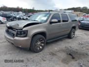 ✅ 2007 Chevrolet Suburban LTZ • VIN: 1GNFC16077J326498 • Lot: 43657422. Listed on IAAI with 252,671 mi. Free auction sales archive from the USA and detailed vehicle history report at DreamBid. Image 2.