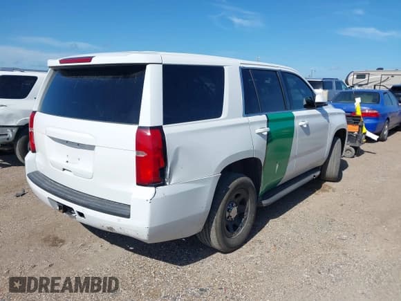 ✅ 2015 Chevrolet Tahoe Commercial • VIN: 1GNLC2EC8FR255526 • Lot: 42538320. Listed on IAAI with 165,502 mi. Free auction sales archive from the USA and detailed vehicle history report at DreamBid. Image 4.