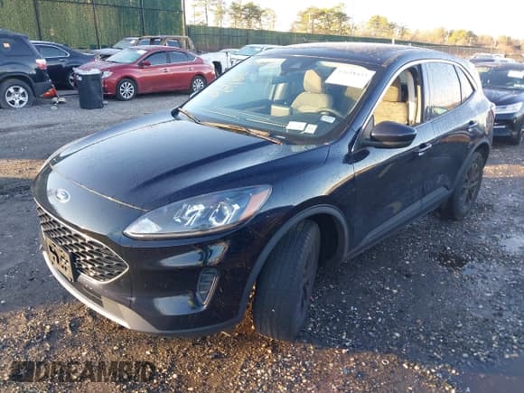 ✅ 2021 Ford Escape SE • VIN: 1FMCU9G65MUA38267 • Lot: 43658433. Listed on IAAI with 77,641 mi. Free auction sales archive from the USA and detailed vehicle history report at DreamBid. Image 2.