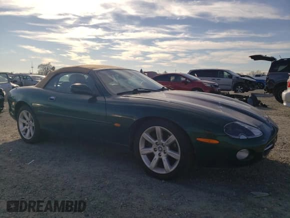 ✅ 2003 Jaguar XK • VIN: SAJDA42C232A31860 • Lot: 88586705. Wystawiony na Copart z przebiegiem 148 846 mil. Bezpłatny archiwum sprzedaży aukcyjnych z USA i szczegółowy raport historii pojazdu na DreamBid. Zdjęcie 4.