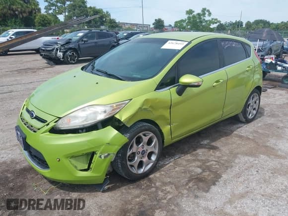 ✅ 2013 Ford Fiesta Titanium • VIN: 3FADP4FJ5DM118042 • Лот: 42678455. Опубликован ранее на IAAI с пробегом 129 249 миль. Бесплатный доступ к архиву аукционных продаж из США и подробный отчёт об истории автомобиля на DreamBid. Изображение 17.