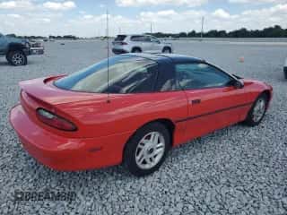 1994 Chevrolet Camaro z VIN 2G1FP22S9R2210259, wystawiony jako Copart lot #51932935 z przebiegiem 213 210 mil mil oraz Czysty tytuł • Clean title. Historia ofert i sprzedaży dostępna na DreamBid. Obrazek 3.