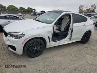 ✅ 2017 BMW X6 xDrive50i • VIN: 5UXKU6C58H0S99559 • Лот: 57902435. Опубликован ранее на Copart с пробегом 79 051 миль. Бесплатный доступ к архиву аукционных продаж из США и подробный отчёт об истории автомобиля на DreamBid. Изображение 1.
