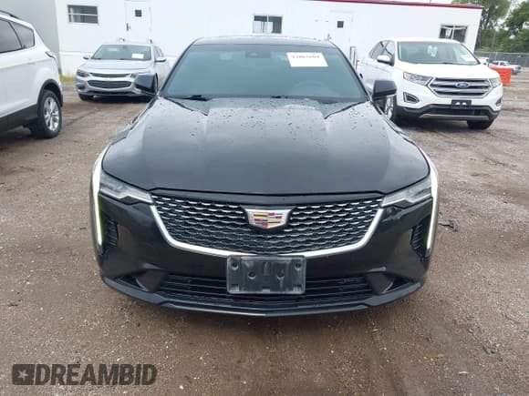 ✅ 2021 Cadillac CT4 Luxury • VIN: 1G6DK5RKXM0136416 • Lot: 42883604. Listed on IAAI with 59,619 mi. Free auction sales archive from the USA and detailed vehicle history report at DreamBid. Image 12.