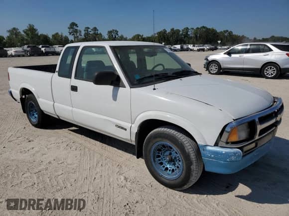 1995 Chevrolet S-10 LS с VIN 1GCCS19Z1S8222291, выставлен на аукционе Copart как лот 77016404 с пробегом 85 792 миль миль и Списание • Salvage title. История ставок и продаж доступна на DreamBid. Изображение 4.