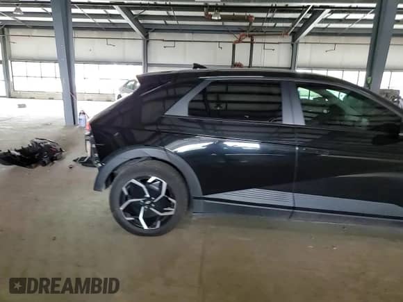 2022 Hyundai Ioniq 5 SE z VIN KM8KMDAF6NU082240, wystawiony jako Copart lot #69711204 z przebiegiem 60 205 mil mil oraz Szkoda całkowita • Salvage title. Historia ofert i sprzedaży dostępna na DreamBid. Obrazek 11.