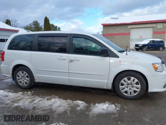 ✅ 2015 Dodge Grand Caravan SE • VIN: 2C4RDGBG9FR668120 • Lot: 43828279. Listed on IAAI with 227,181 mi. Free auction sales archive from the USA and detailed vehicle history report at DreamBid. Image 14.