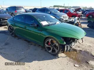 ✅ 2019 Audi RS 5 Sportback • VIN: WUABWCF54KA904316 • Lot: 41205564. Listed on IAAI with 36,727 mi. Free auction sales archive from the USA and detailed vehicle history report at DreamBid. Image 1.