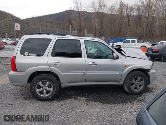 ✅ 2005 Mazda Tribute LX • VIN: 4F2CZ94105KM04843 • Лот: 43729640. Опубликован ранее на IAAI с пробегом 172 641 миль. Бесплатный доступ к архиву аукционных продаж из США и подробный отчёт об истории автомобиля на DreamBid. Изображение 13.