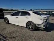 ✅ 2018 Toyota Camry LE • VIN: JTNB11HK0J3000772 • Lot: 84382425. Listed on Copart with 100,084 mi. Free auction sales archive from the USA and detailed vehicle history report at DreamBid. Image 2.