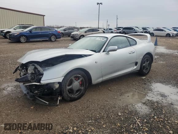 ✅ 1994 Toyota Supra • VIN: JZA800003832 • Lot: 47542995. Listed on Copart with 129,896 mi. Free auction sales archive from the USA and detailed vehicle history report at DreamBid. Image 1.