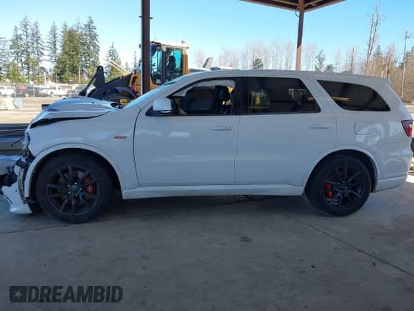 2018 Dodge Durango SRT with VIN 1C4SDJGJ3JC395759, listed as a IAAI auction lot 41689356 with 83,577 mi miles and . Bid and sale history available at DreamBid. Image 15.