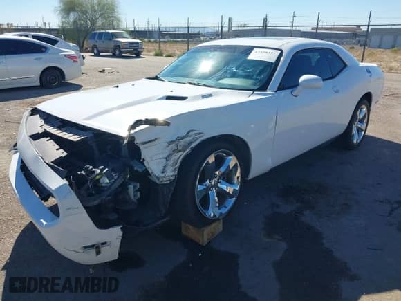 2011 Dodge Challenger R/T z VIN 2B3CJ5DT0BH565702, wystawiony jako IAAI lot #43528357 z przebiegiem 120 653 mil mil oraz . Historia ofert i sprzedaży dostępna na DreamBid. Obrazek 17.