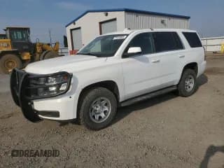 ✅ 2018 Chevrolet Tahoe Commercial • VIN: 1GNSKFEC4JR125807 • Lot: 70448685. Listed on Copart with 128,487 mi. Free auction sales archive from the USA and detailed vehicle history report at DreamBid. Image 1.