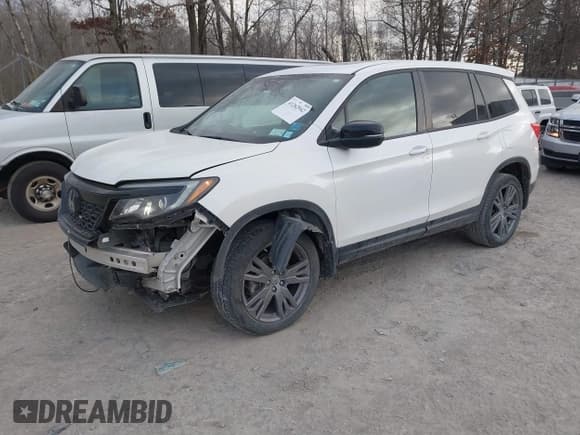 ✅ 2021 Honda Passport EX-L • VIN: 5FNYF8H55MB004813 • Lot: 41262942. Listed on IAAI with 69,585 mi. Free auction sales archive from the USA and detailed vehicle history report at DreamBid. Image 2.