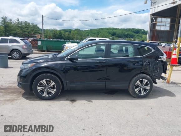 ✅ 2019 Honda CR-V LX • VIN: 2HKRW6H3XKH208867 • Lot: 42380361. Wystawiony na IAAI z przebiegiem 50 941 mil. Bezpłatny archiwum sprzedaży aukcyjnych z USA i szczegółowy raport historii pojazdu na DreamBid. Zdjęcie 15.