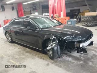 ✅ 2011 Audi A8 • VIN: WAURVAFD4BN023521 • Lot: 43546471. Listed on IAAI with 153,355 mi. Free auction sales archive from the USA and detailed vehicle history report at DreamBid. Image 1.