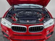 ✅ 2016 BMW X5 M • VIN: 5YMKT6C59G0R78539 • Lot: 94393935. Listed on Copart with 140,797 mi. Free auction sales archive from the USA and detailed vehicle history report at DreamBid. Image 7.