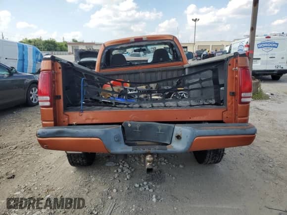 2001 Dodge Dakota Sport z VIN 1B7GG26N31S197440, wystawiony jako Copart lot #68280665 z przebiegiem Nie podano mil oraz Szkoda całkowita • Salvage title. Historia ofert i sprzedaży dostępna na DreamBid. Obrazek 6.